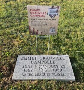 Photo showing Emmet Campbell's gravestone and 'QR Code' sign